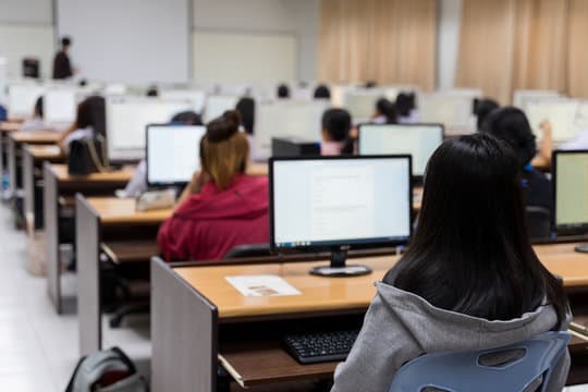 Students collaborating in a lab setting